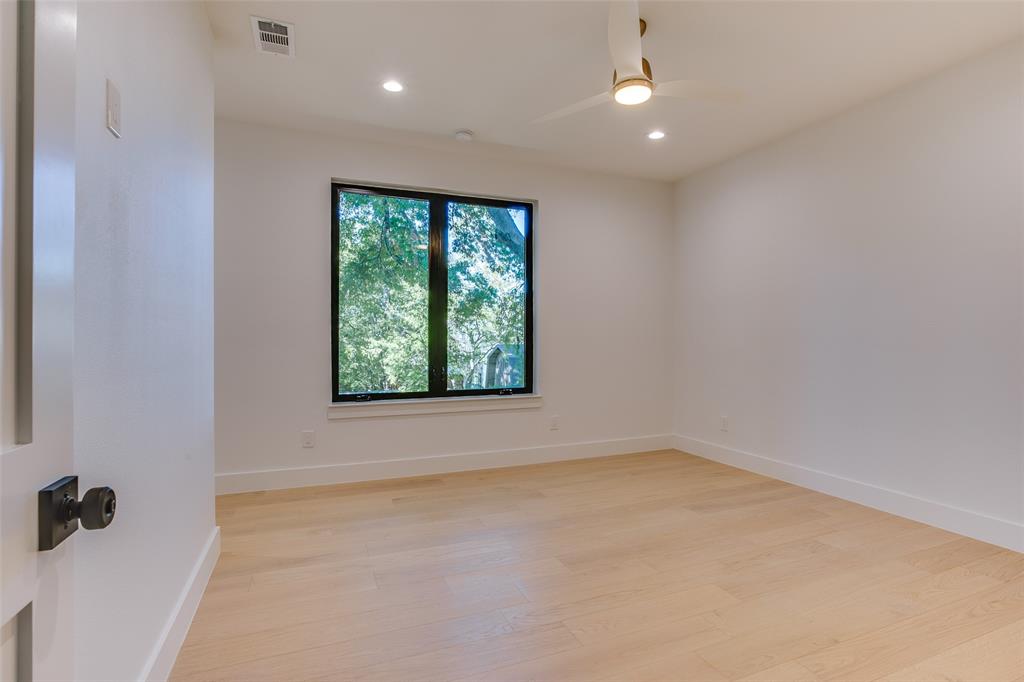 4311 Merrell Road Dallas, TX 75229 - Photo 20 of 30 an empty room with a window
