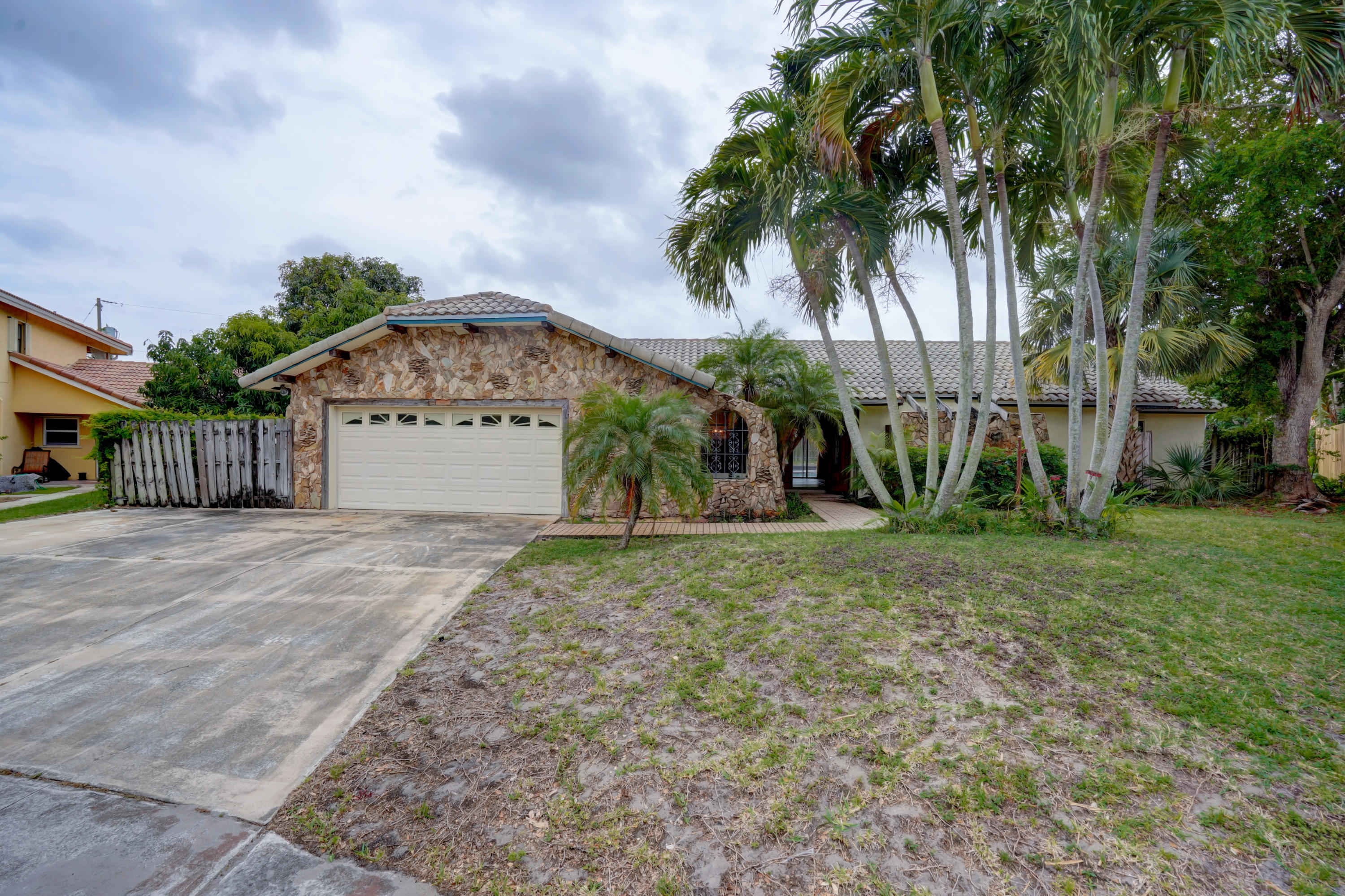 1300 Southwest 2nd Street Boca Raton, FL 33486 - Photo 1 of 18 a view of a backyard