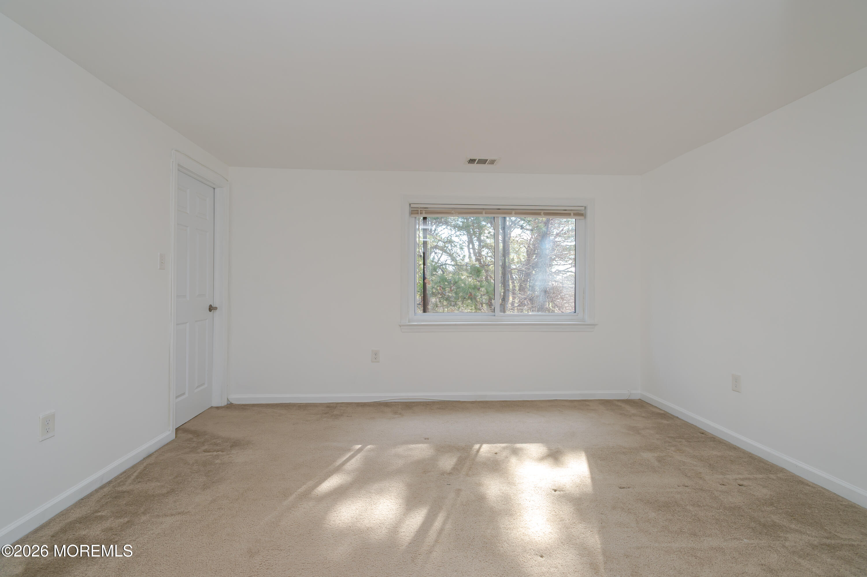 608 Alpine Trail Neptune Township, NJ 07753 - Photo 11 of 27 an empty room with a window