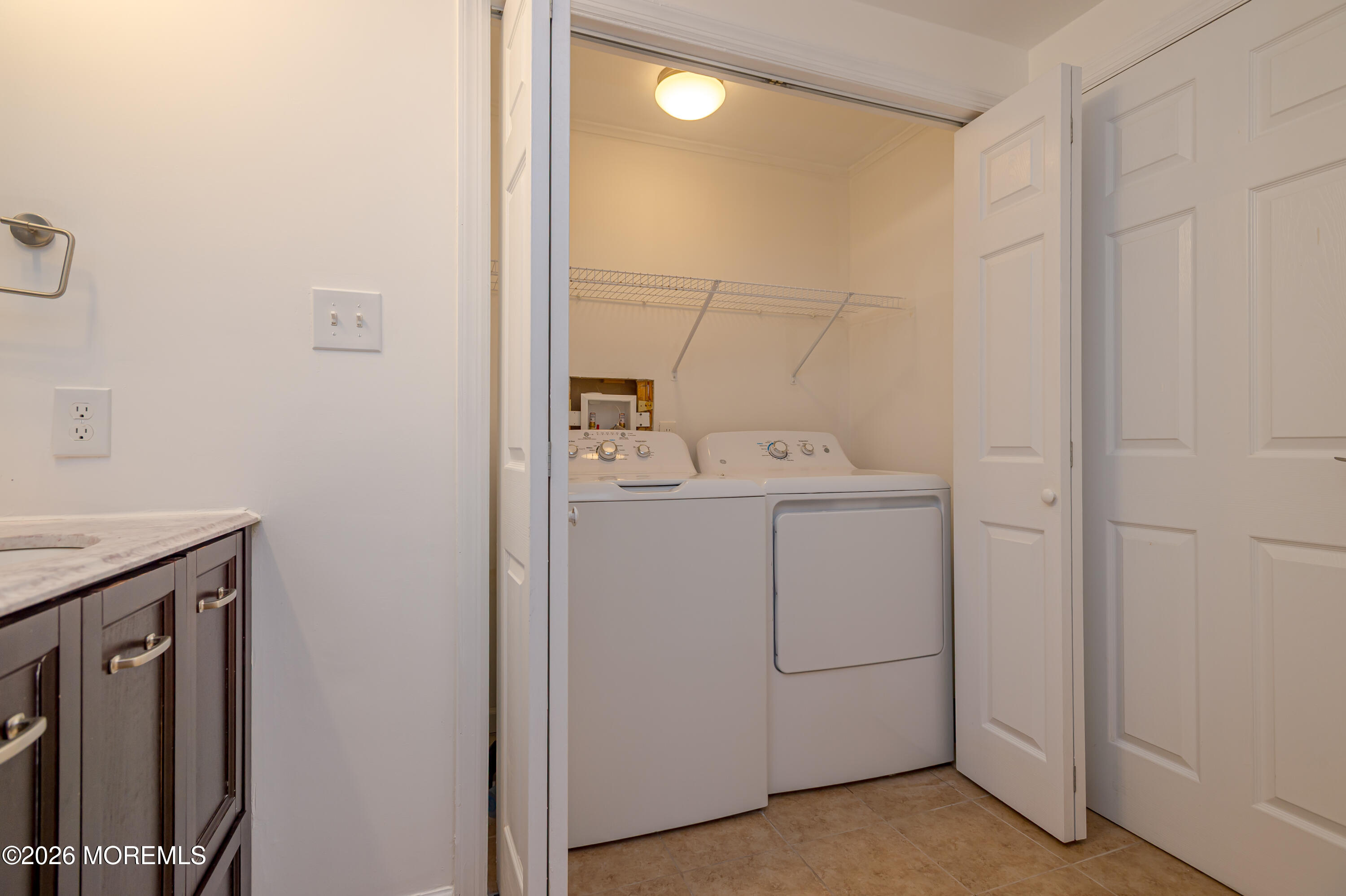 608 Alpine Trail Neptune Township, NJ 07753 - Photo 16 of 27 a utility room with dryer and washer