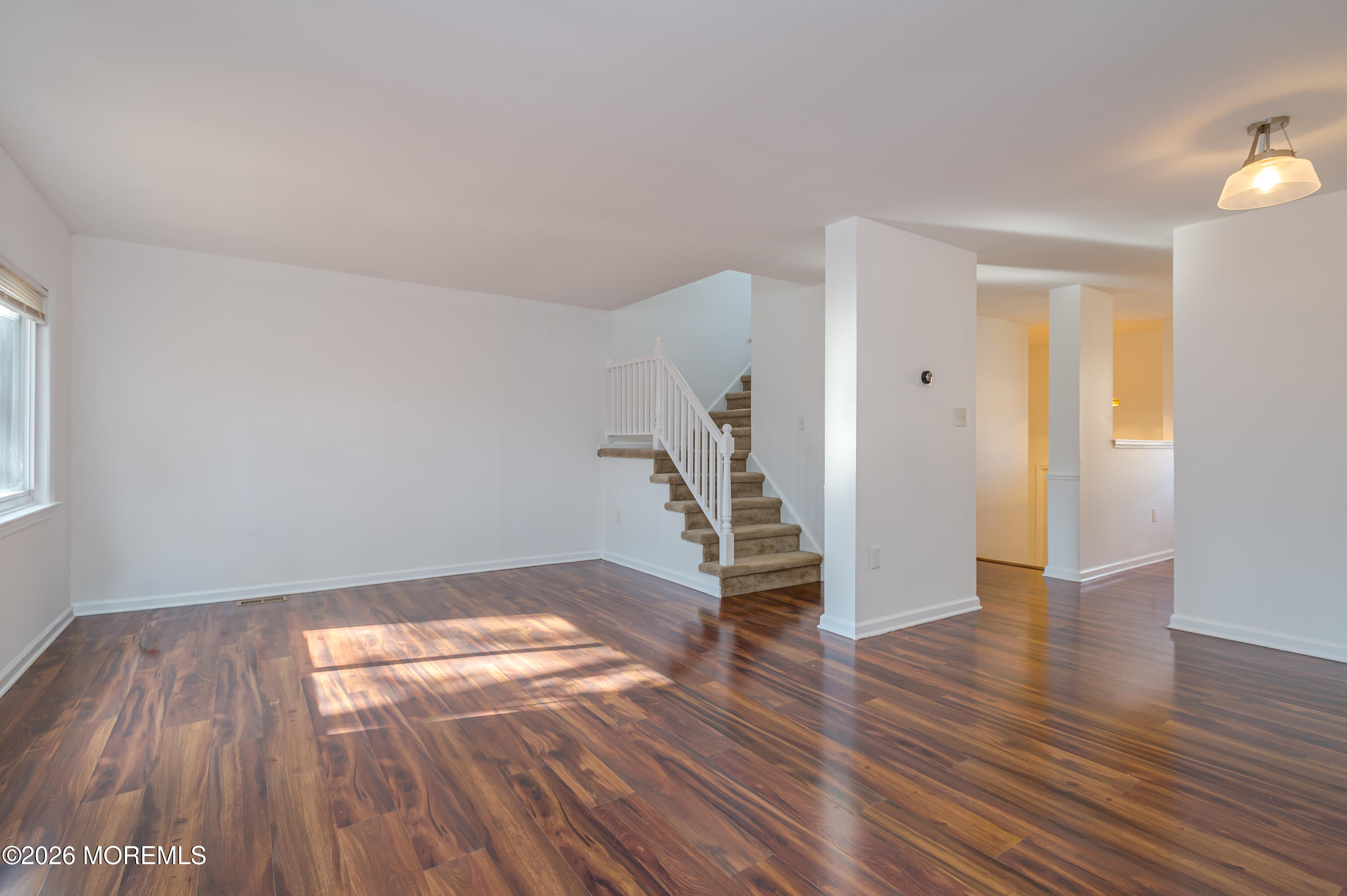 608 Alpine Trail Neptune Township, NJ 07753 - Photo 6 of 27 a view of empty room with wooden floor