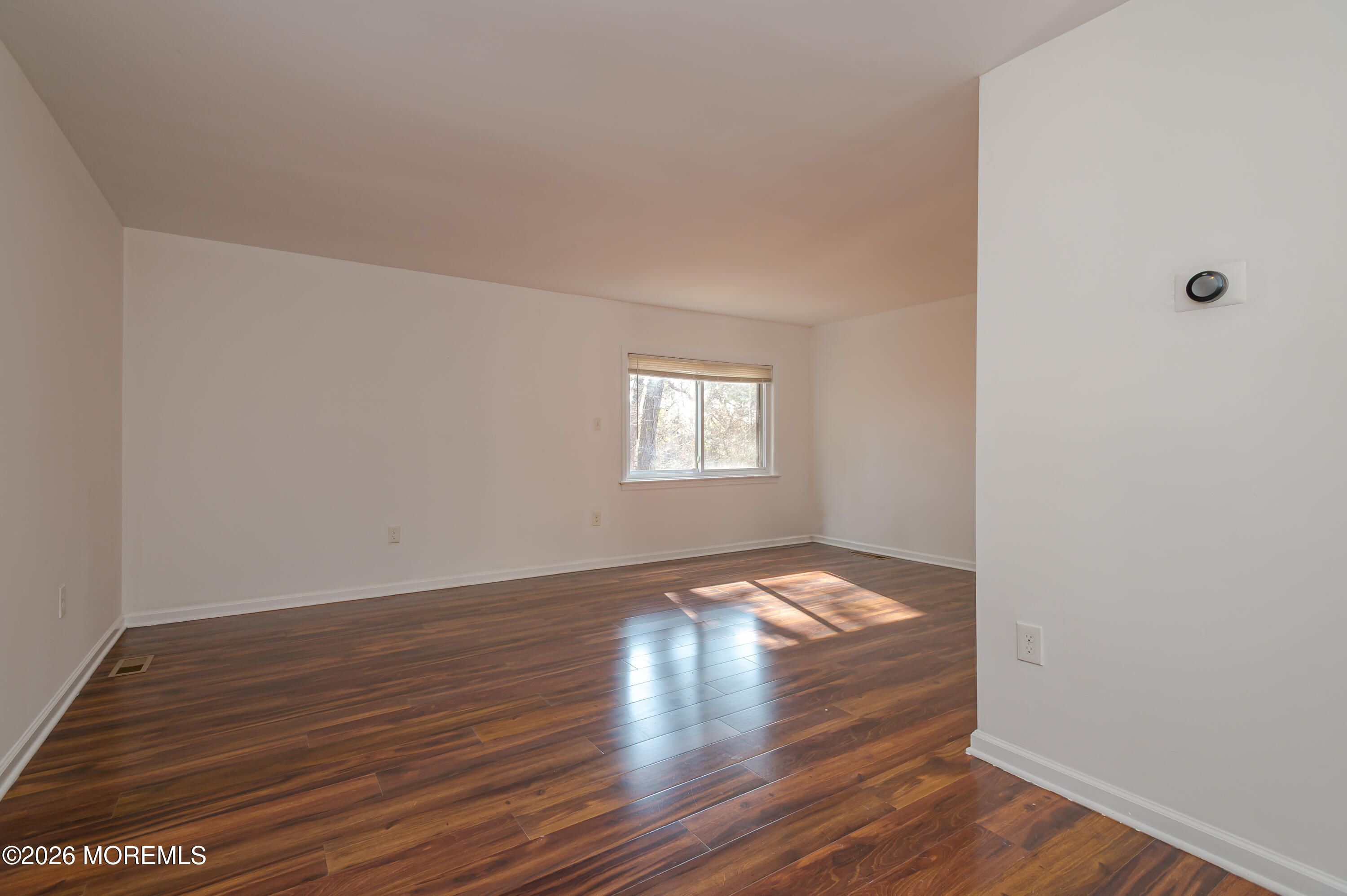 608 Alpine Trail Neptune Township, NJ 07753 - Photo 8 of 27 a view of an empty room and window