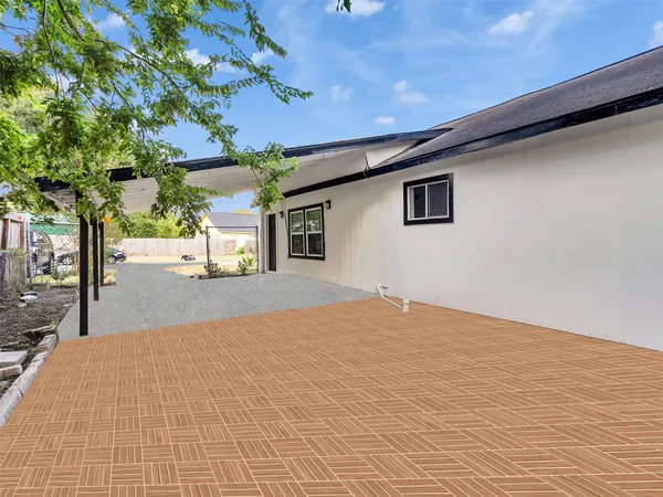 a view of garage and yard