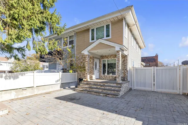 a front view of a house with a porch