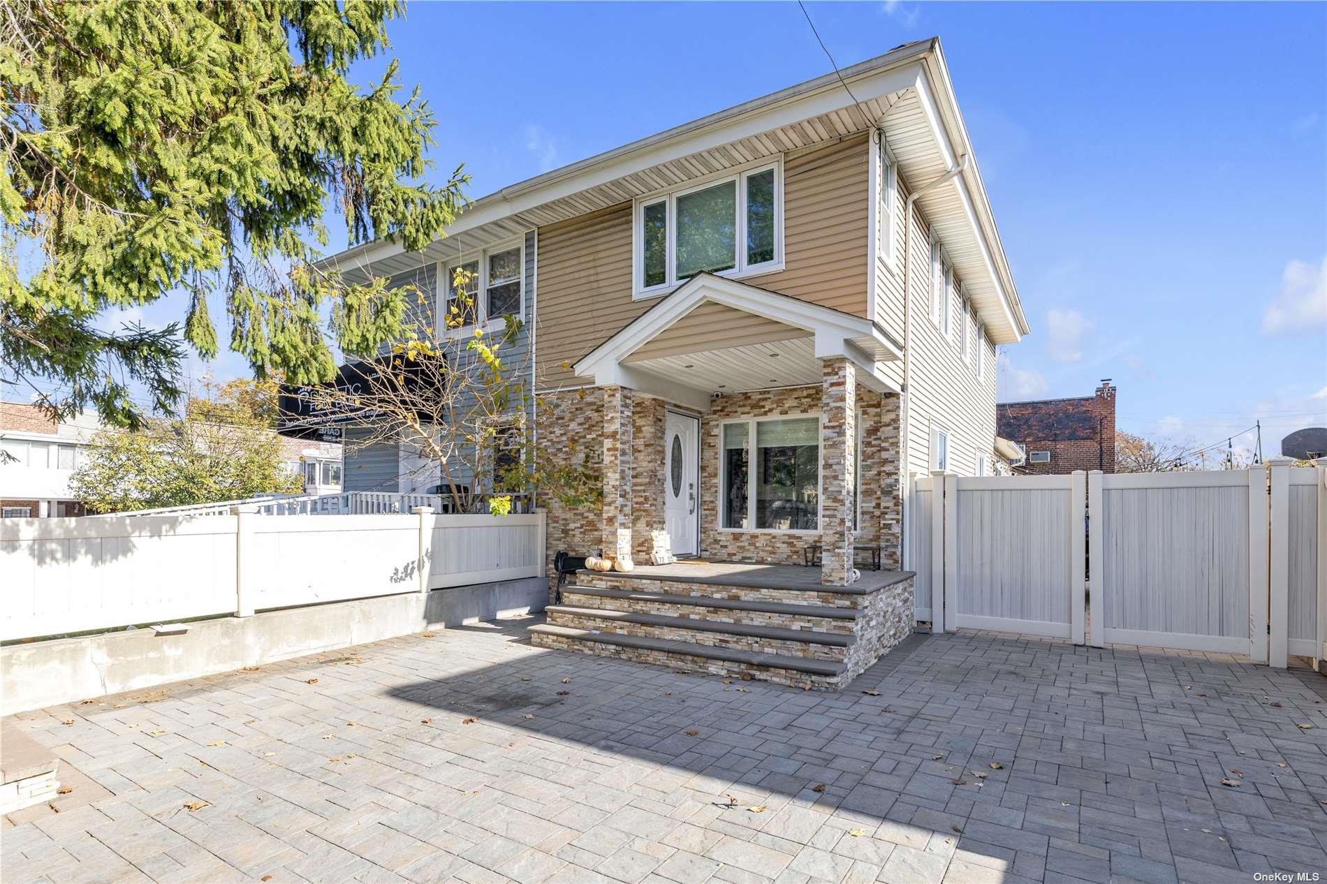 a front view of a house with a porch
