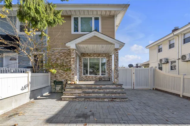 a front view of a house with a porch