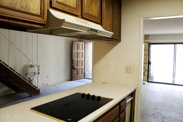 a view of a hallway with entryway