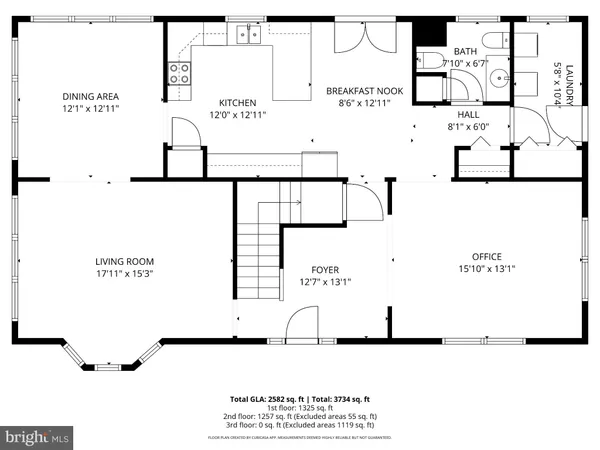 a bedroom with a bed and dresser with wooden floor