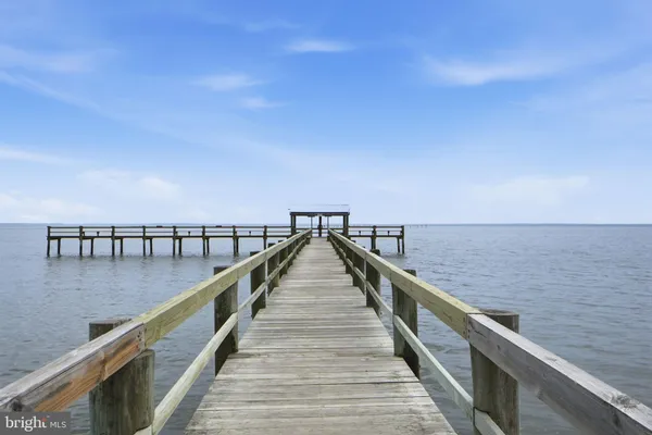 a view of wooden floor with a lake