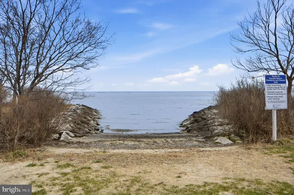 an aerial view of residential building and ocean view
