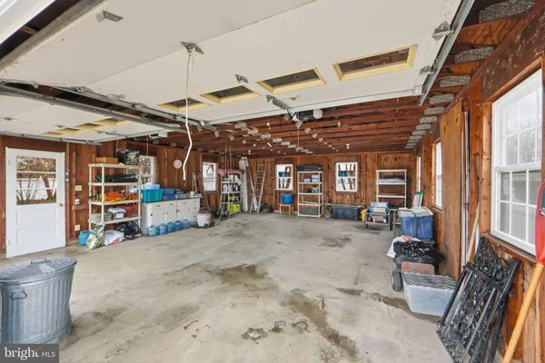 a view of a room with wooden walls