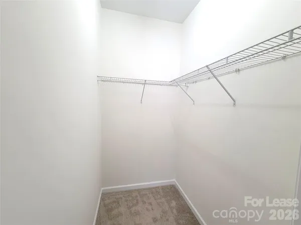 a view of small space with racks on the wall