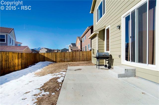 2174 Reed Grass Way Colorado Springs, CO 80915 - Photo 27 of 27 Back yard and patio