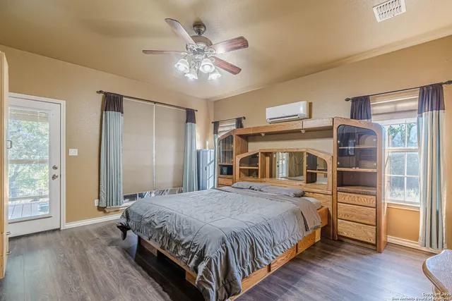 a spacious bathroom with a double vanity sink and a mirror