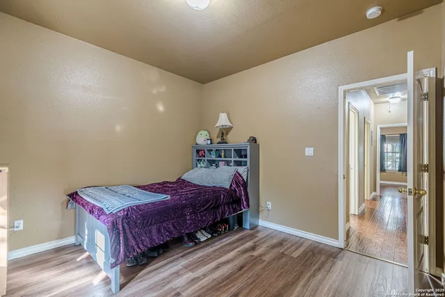 a kitchen with stainless steel appliances granite countertop a stove microwave and cabinets