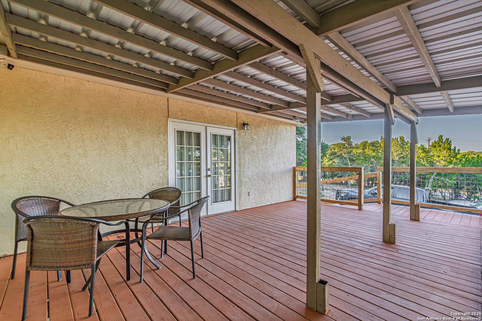 249 Lakeridge Loop Lakehills, TX 78063 - Photo 34 of 50 a patio with table and chairs