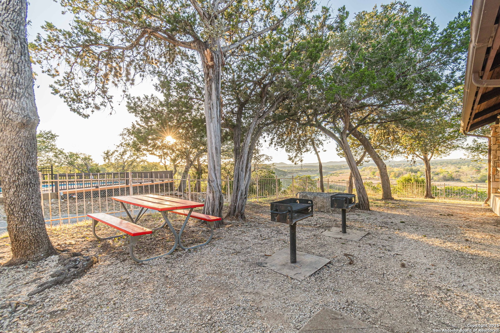 249 Lakeridge Loop Lakehills, TX 78063 - Photo 46 of 50 a view of outdoor space with playground and green space