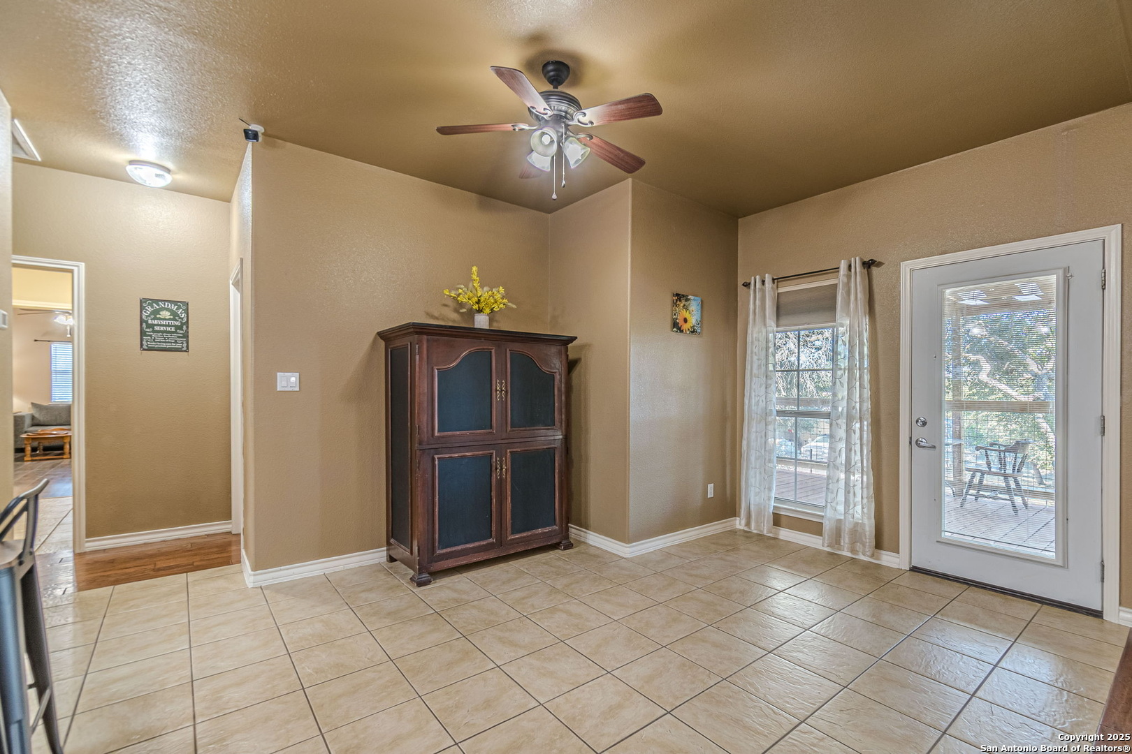 249 Lakeridge Loop Lakehills, TX 78063 - Photo 9 of 50 a view of an empty room with cabinet and a window