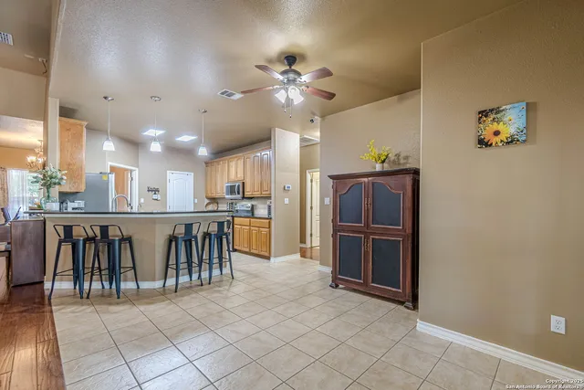 a kitchen with stainless steel appliances granite countertop a stove and a sink