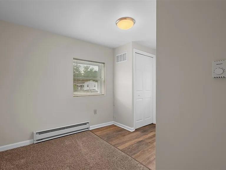 1122 A Pittsburgh Road Valencia, PA 16059 - Photo 12 of 16 a view of an empty room with a window