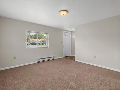1122 A Pittsburgh Road Valencia, PA 16059 - Photo 5 of 16 an empty room with windows and closet