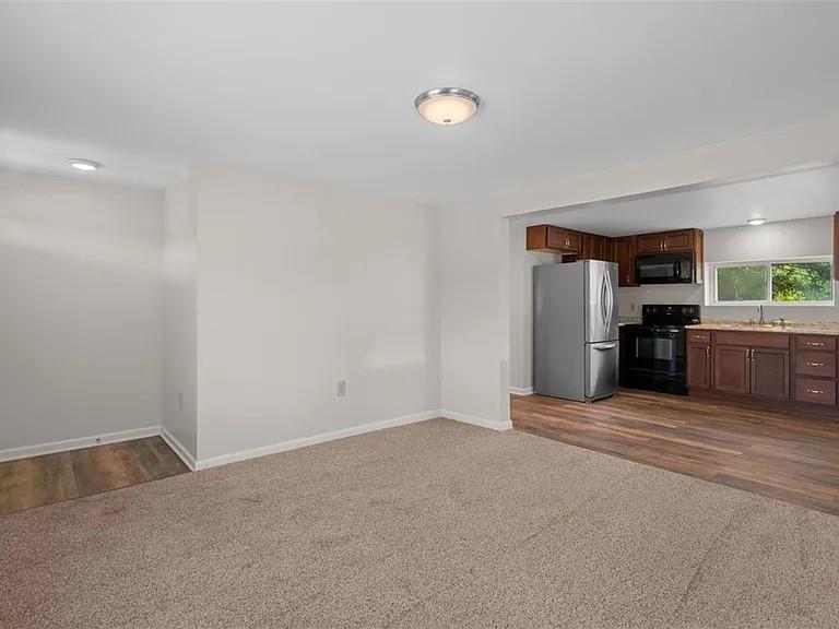 1122 A Pittsburgh Road Valencia, PA 16059 - Photo 6 of 16 a view of an empty room with a kitchen