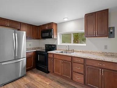 1122 A Pittsburgh Road Valencia, PA 16059 - Photo 8 of 16 a kitchen with a sink stove and refrigerator