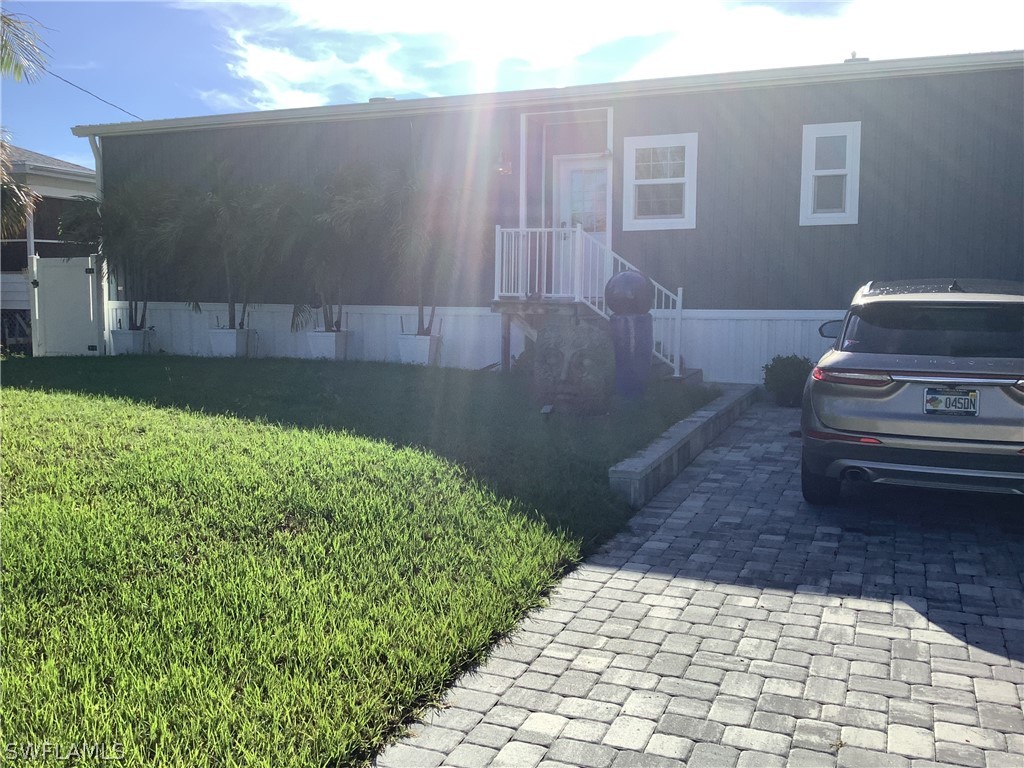 2642 York Road St. James City, FL 33956 - Photo 1 of 14 a view of a backyard with plants