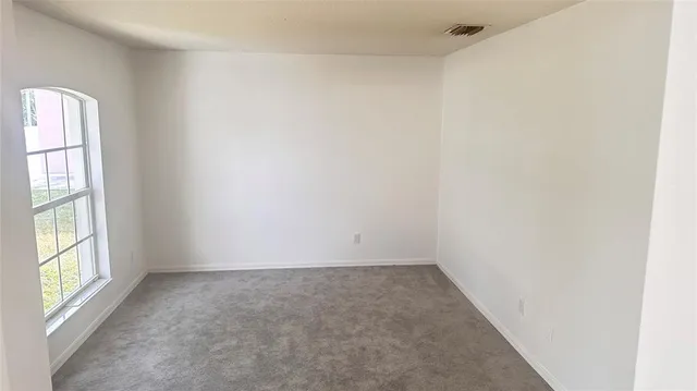 a kitchen with a sink stove and refrigerator