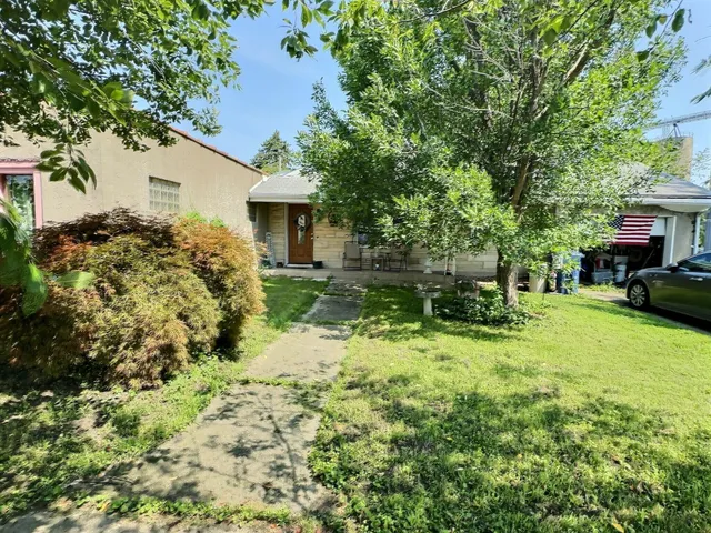 a house view with a garden space