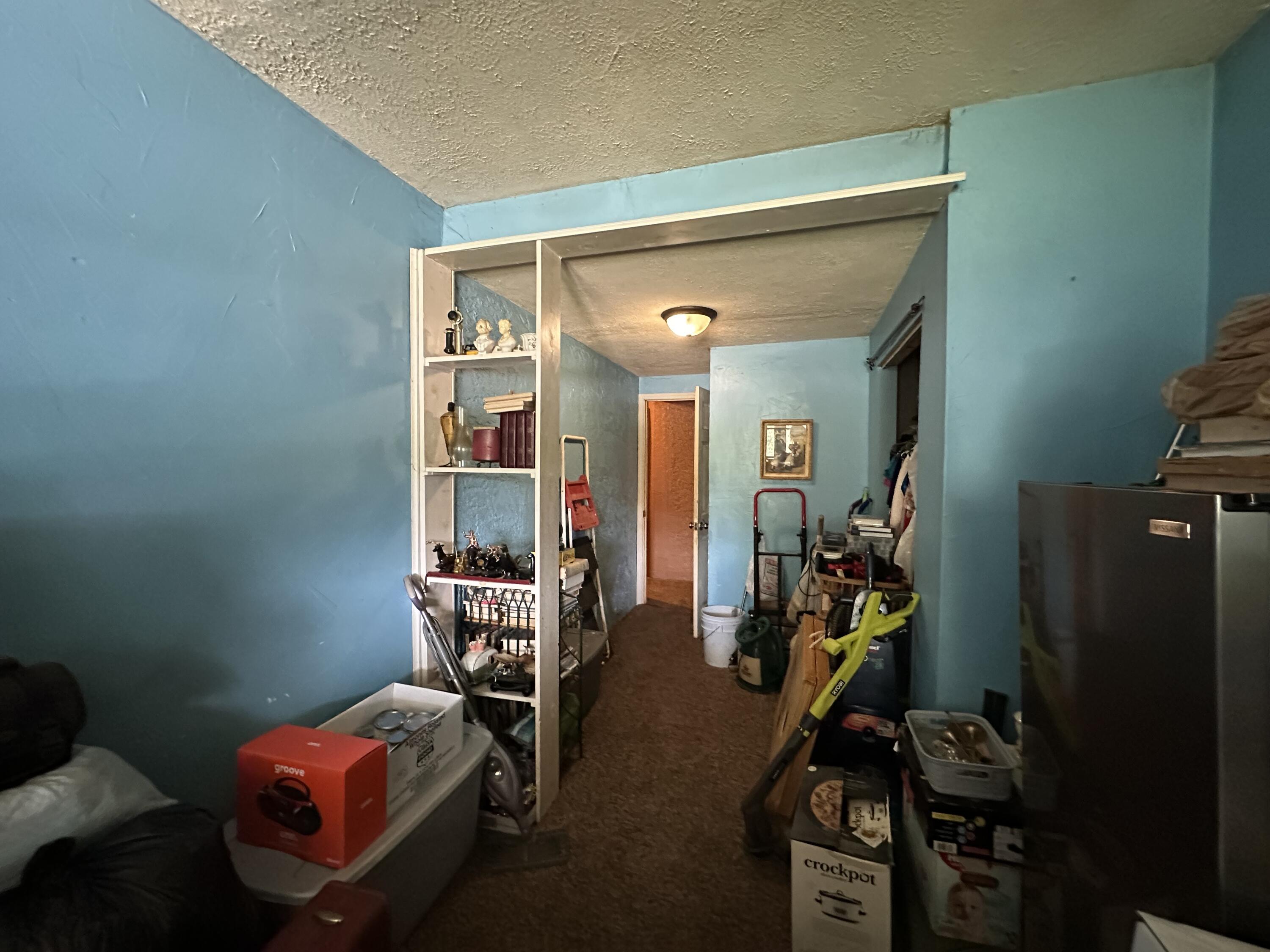 224 East State Street Morocco, IN 47963 - Photo 13 of 17 a bedroom with furniture and a window