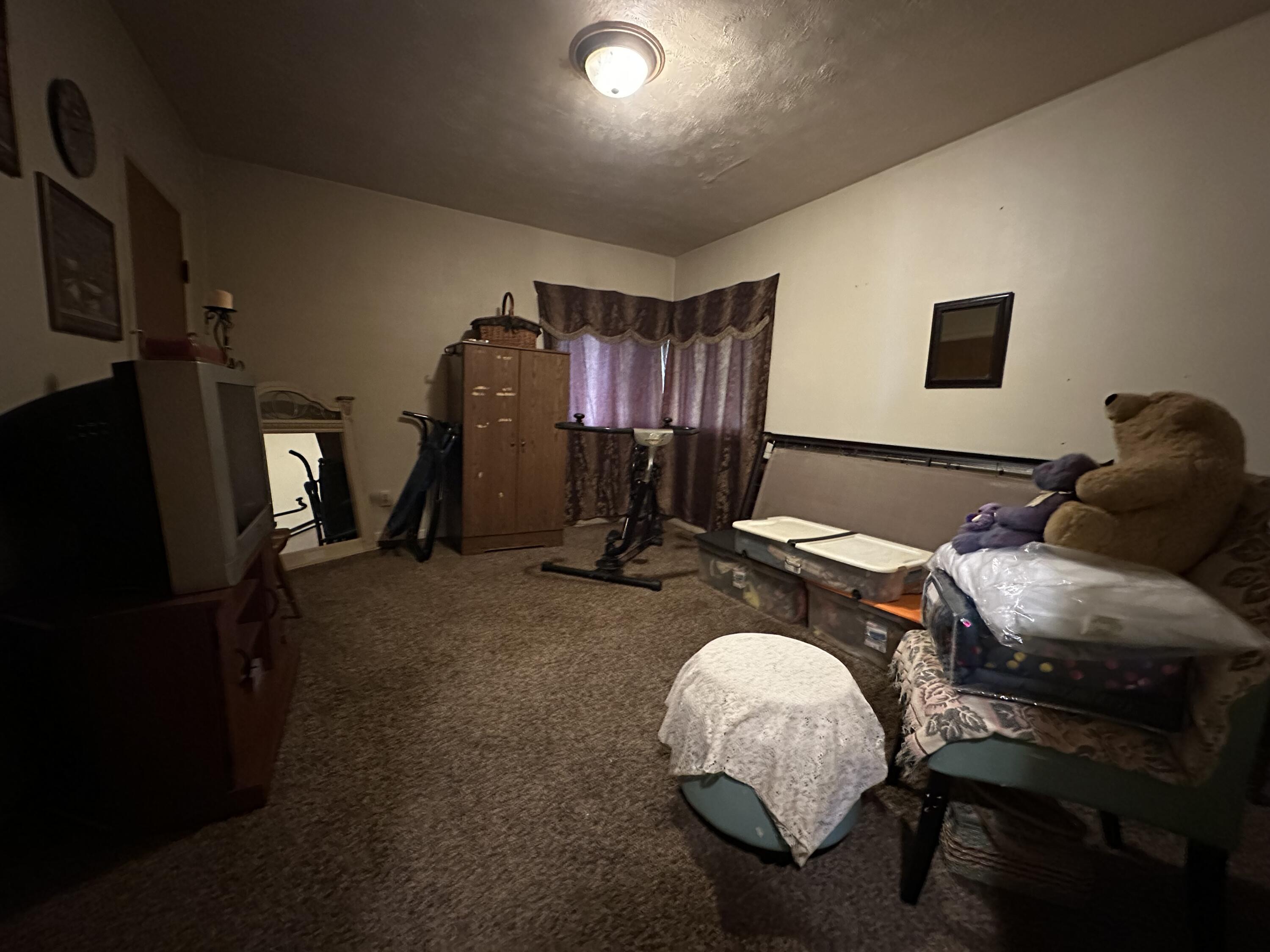 224 East State Street Morocco, IN 47963 - Photo 14 of 17 a living room with furniture and a flat screen tv