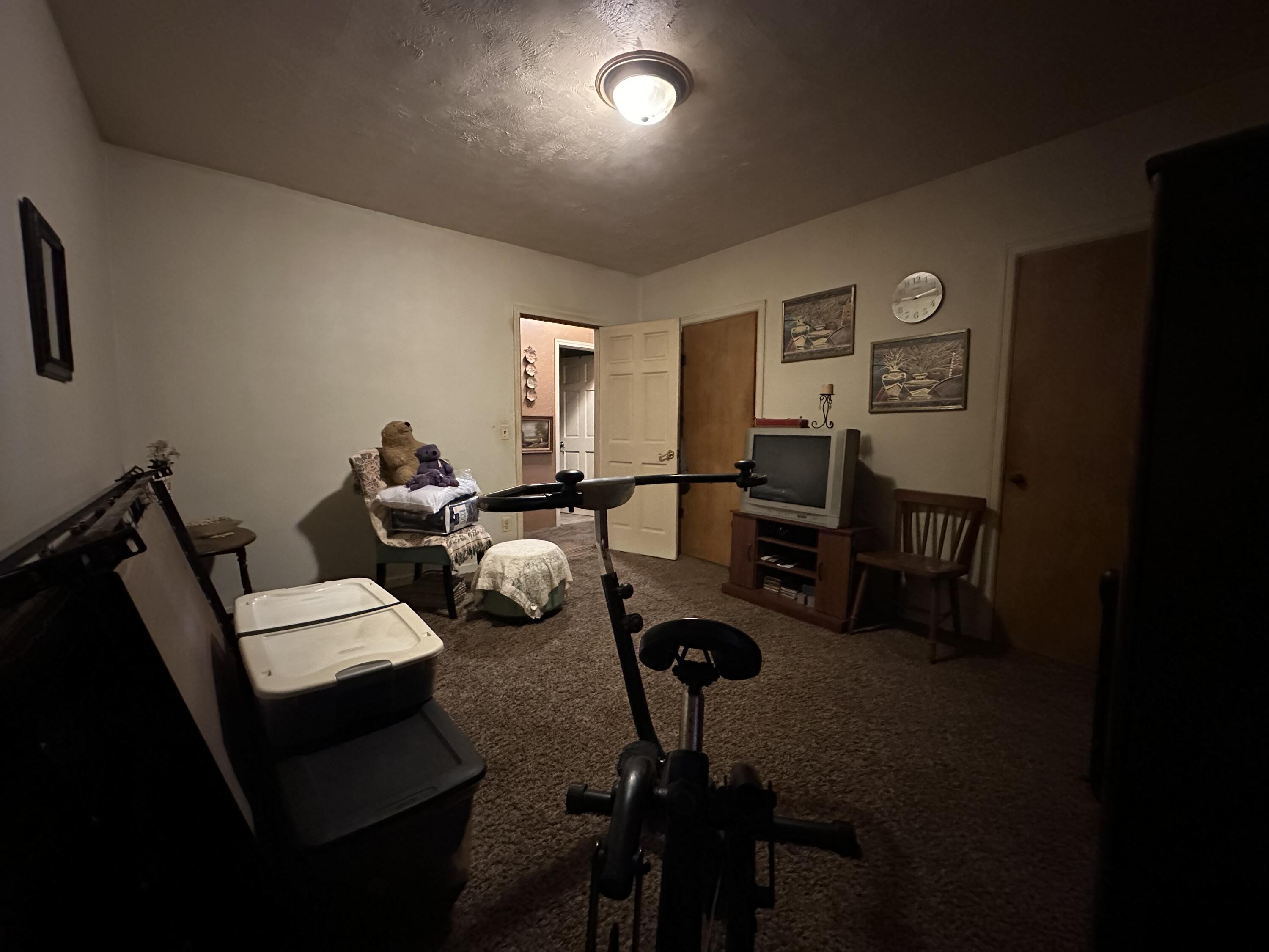 224 East State Street Morocco, IN 47963 - Photo 15 of 17 a living room with furniture and wooden floor