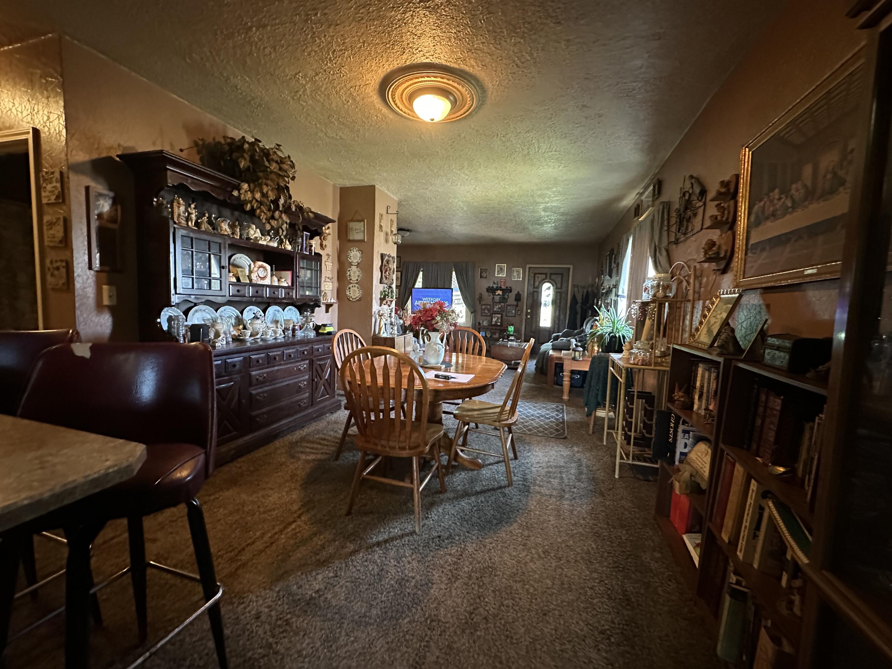 224 East State Street Morocco, IN 47963 - Photo 5 of 17 a view of a chairs and tables in a room