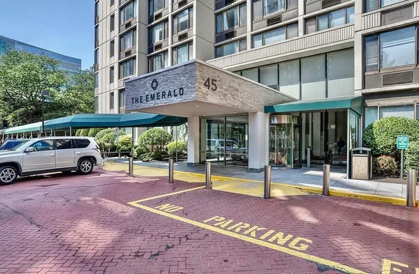a front view of a building with street view