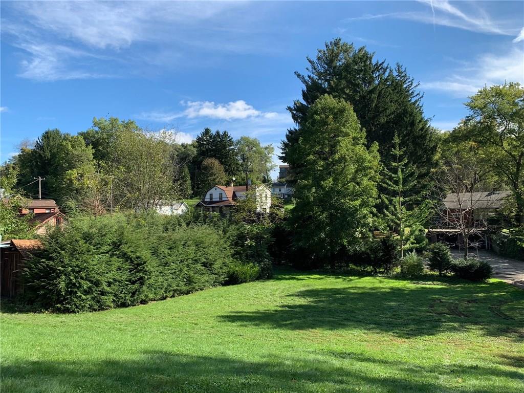 201 Highway 68 Rochester, PA 15074 - Photo 2 of 24 A beautiful view of the front yard. The pool is behind the hedge to the left. The home is set back from the road and the views surrounding the home are beautiful!