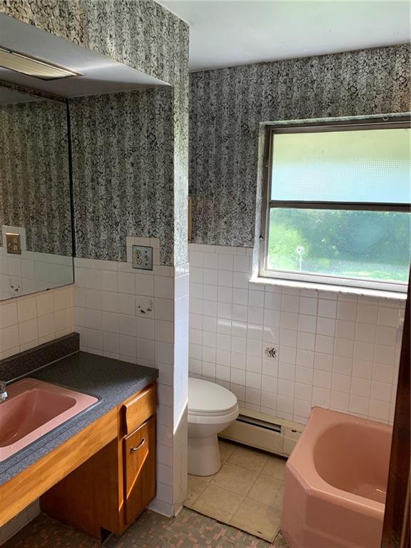 201 Highway 68 Rochester, PA 15074 - Photo 15 of 24 Bathroom has plenty of counter space, bathtub and walk-in shower.