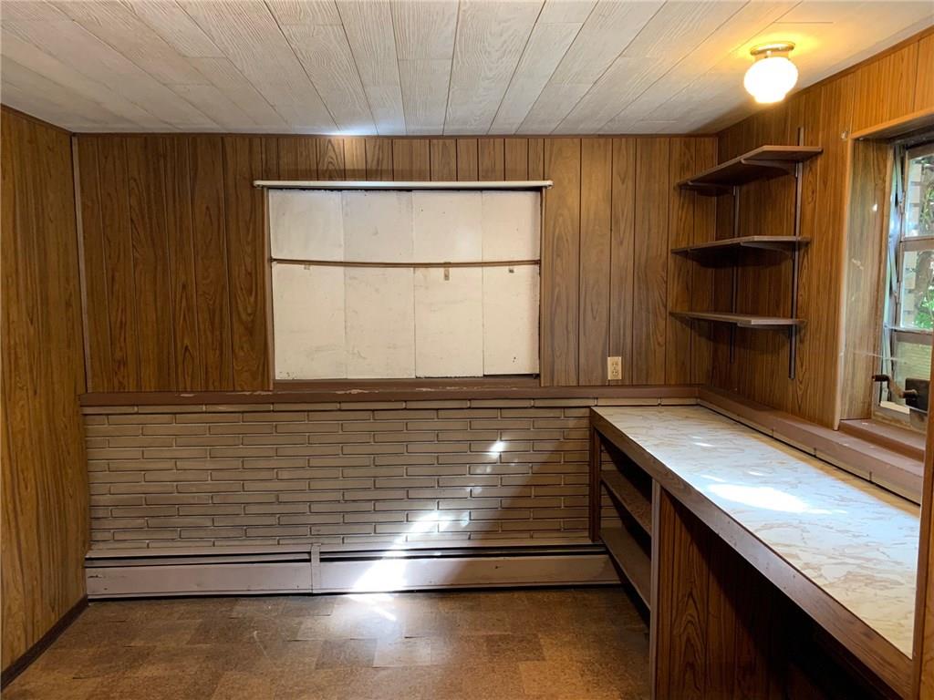 201 Highway 68 Rochester, PA 15074 - Photo 18 of 24 This room has so many possibilities: home office / den, craft room, or even a possible fourth bedroom located on the lower level near the family room.