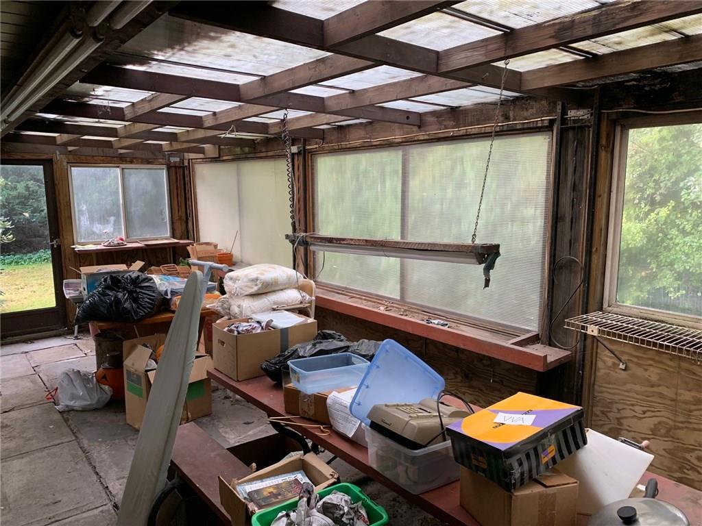 201 Highway 68 Rochester, PA 15074 - Photo 21 of 24 Enclosed patio with heater, perfect for a winter indoor garden.