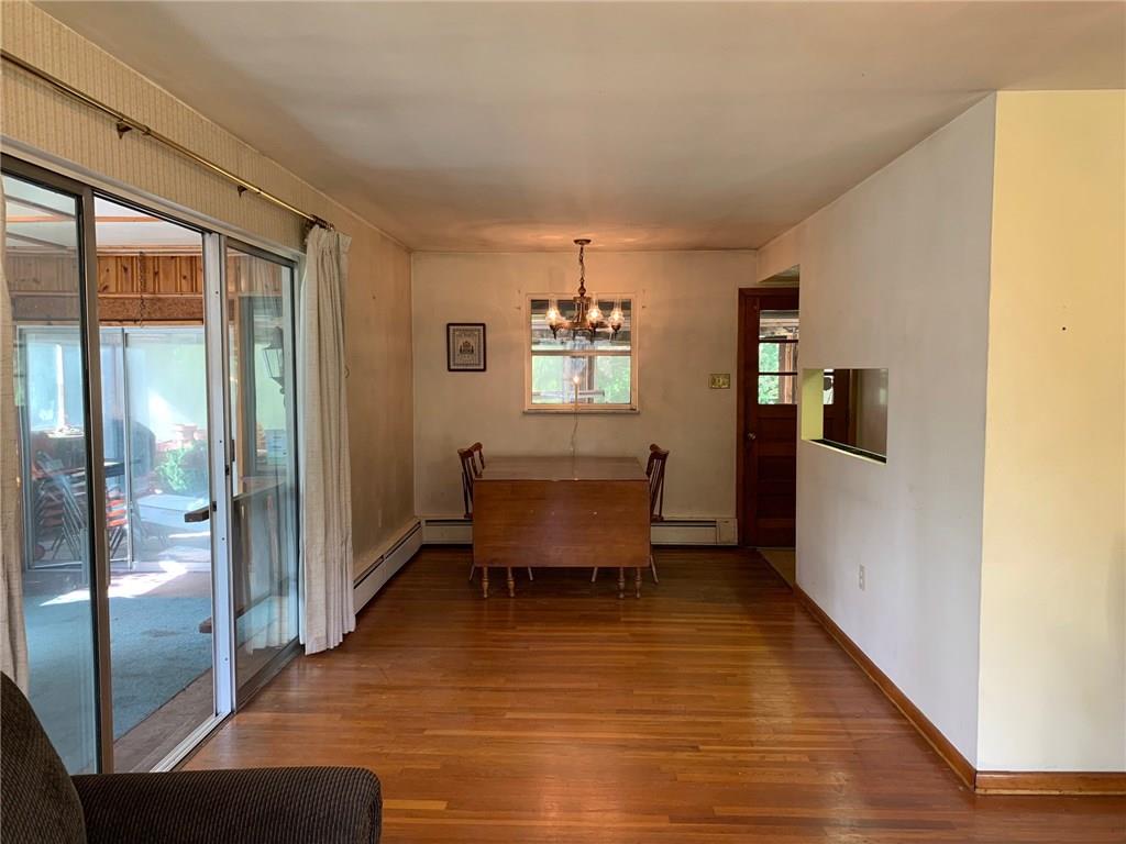 201 Highway 68 Rochester, PA 15074 - Photo 5 of 24 Expand the dining room table for easy entertaining.