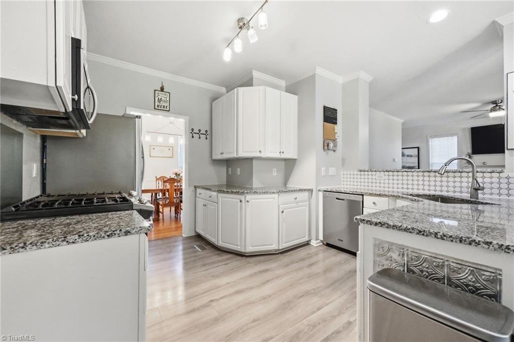 1914 Treyburn Lane High Point, NC 27265 - Photo 5 of 48 Kitchen with Granite Countertops and Stainless Steel Appliances