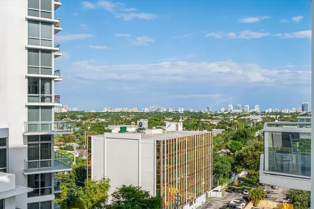 a view of a city with tall buildings