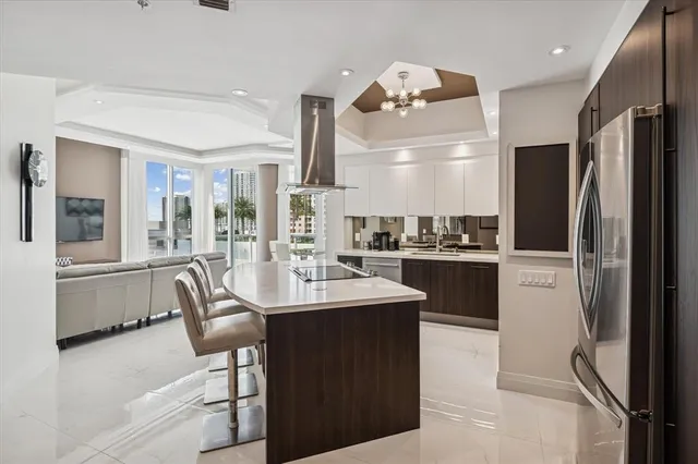 a kitchen with counter top space cabinets and stainless steel appliances