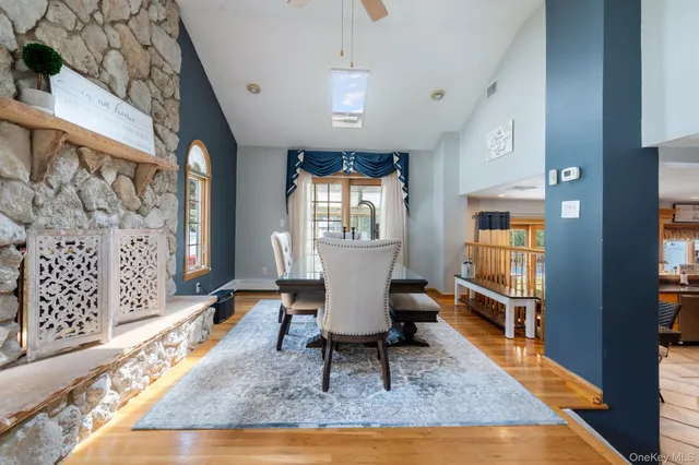 a living room with furniture rug and window