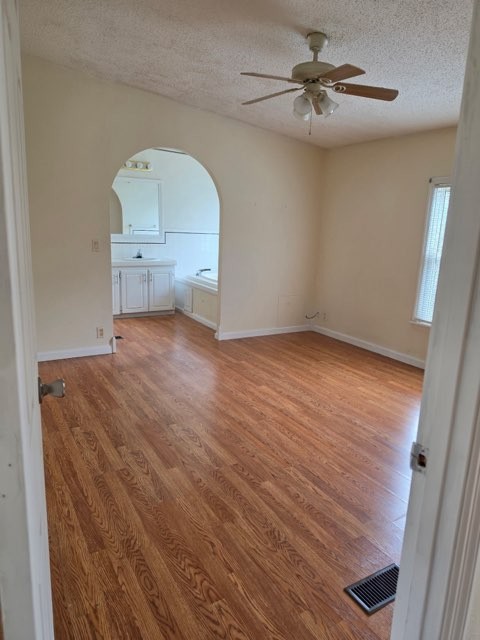 225 East Prospect Road Fayetteville, TN 37334 - Photo 7 of 11 wooden floor in an empty room with a window