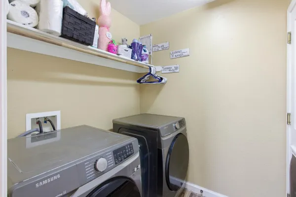 a utility room with dryer and washer