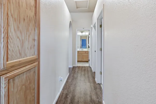 a view of a bathroom from the hallway