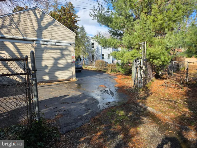 a car parked in front of a house