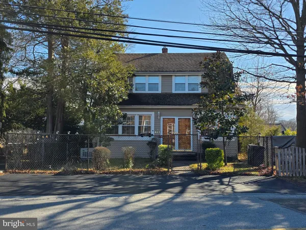 a view of a house with a street