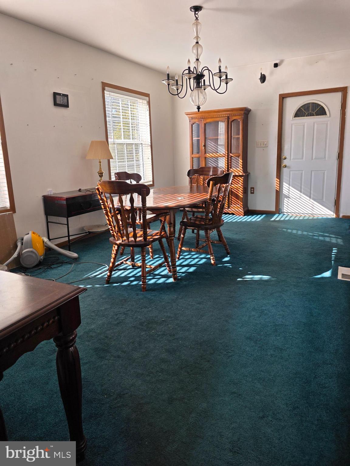 441 Manchester Avenue Media, PA 19063 - Photo 5 of 24 a view of a dining room with furniture and chandelier